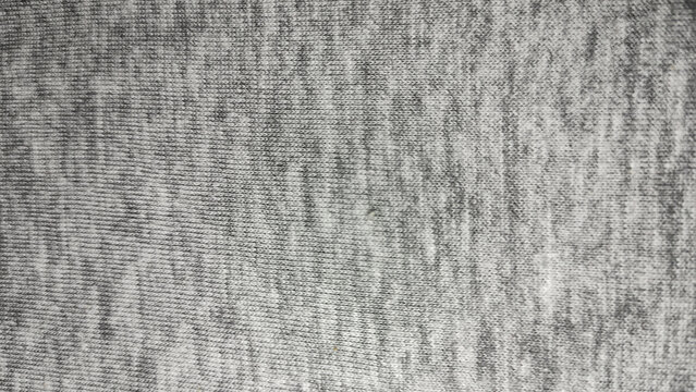 Heather grey knitted cotton fabric with textured light and dark pattern