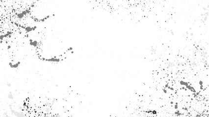 Obraz premium A white background with randomly scattered ink drops throughout.