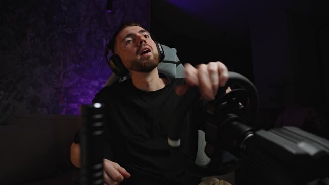 Stunned gamer reacting to sudden crash, hands raised near wheel, shocked expression, dark studio glow and tense posture
