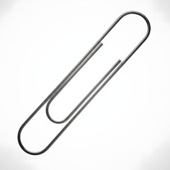 Obraz premium A single polished metallic paperclip is angled diagonally to demonstrate professional organization and reliable office stationery for document management tasks.