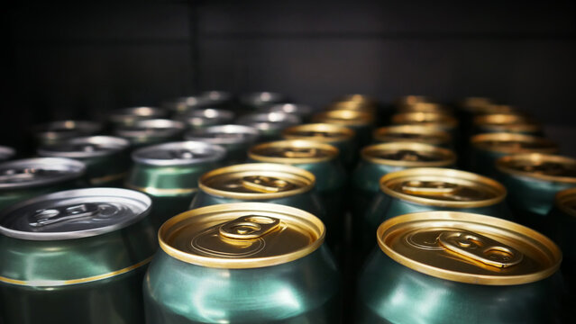 Nice gold and silver aluminum beer cans on a store display
