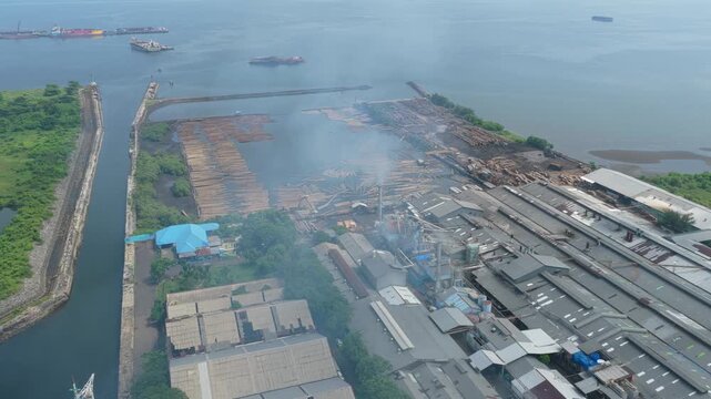 Aerial view of sawmill plant manufacturing and log floating