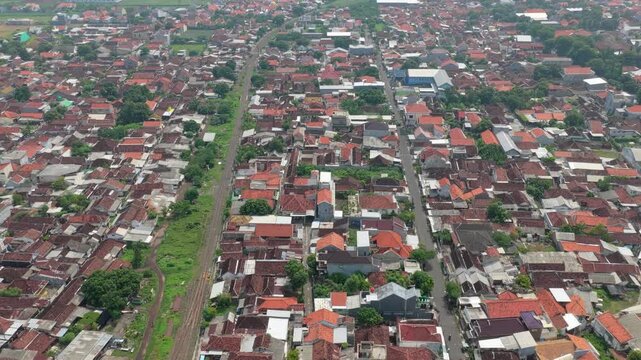 Aerial view of probolinggo city rooftops and railway in east java