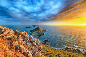 Amazing sunset over Torra di a Parata with Genoese Tower and Archipelago of Sanguinaires islands at background. © pilat666