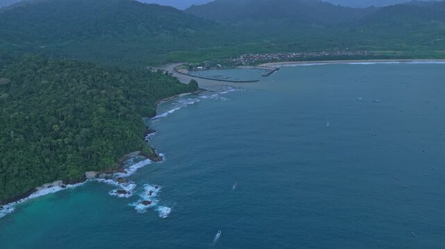 Aerial drone flying over red island java indonesia coastline