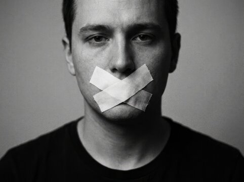 Portrait of a Man Gagged with Tape Silenced.