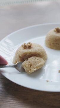 Close-up of traditional Turkish semolina halva with hazelnuts