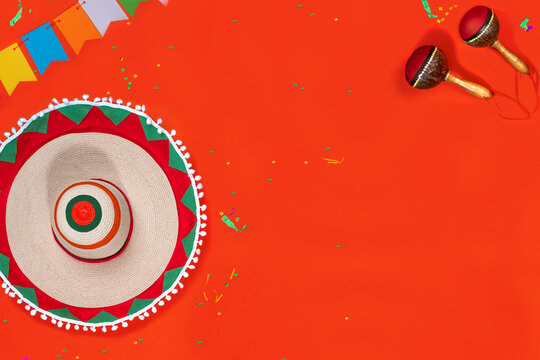 Mexican Independence Day and Cinco de Mayo concept. Background with sombrero, Maracas for greeting card, invitation, advertising.
