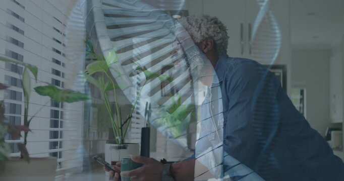 man checking phone for tech alert leaning on counter, helix overlay hovering across him and blinds