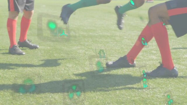 Red defender approaching and sliding, trying to win ball in soccer drill, HUD icons tracking play