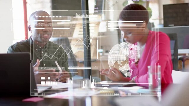 Man starting meeting gesturing pen while woman tapping tablet, overlay updating business charts