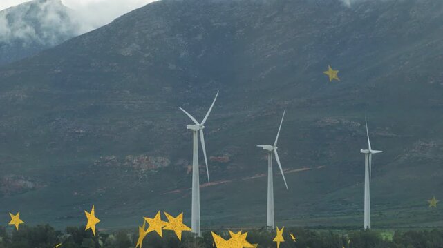 Star overlay starting, 3 wind turbines rotating while stars drifting across frame, adding appeal