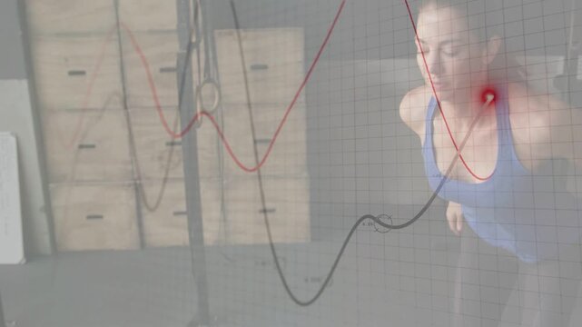 Woman placing foot on plyo box, initiating step-up squats, waveform syncing chest nodes for fitness