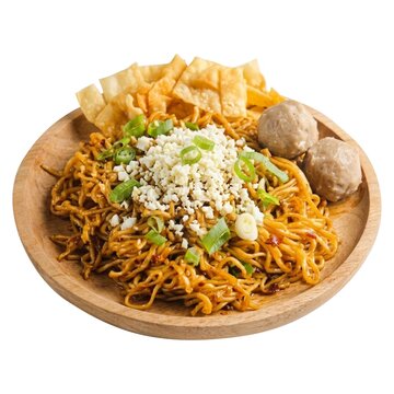 Indonesian Spicy Noodle Mie Jebew with Meatballs and Fried Dumplings on Wooden Plate