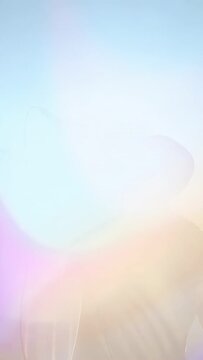 Vertical video: Male singer singing into mic for music, beam washing into silhouette, revealing him