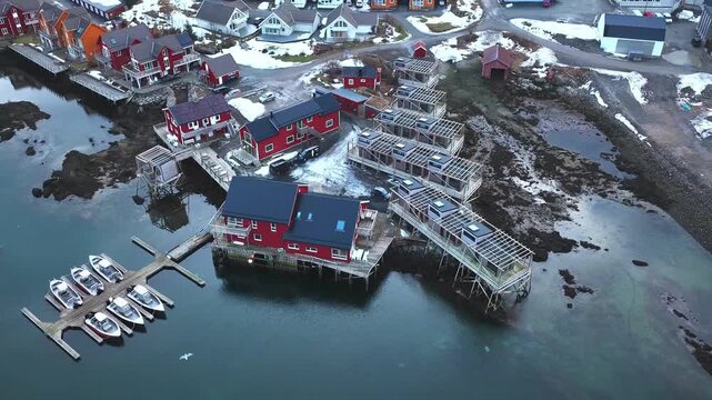 Aerial view of the iconic red fishing houses of Hamnoy village in winter Norway
