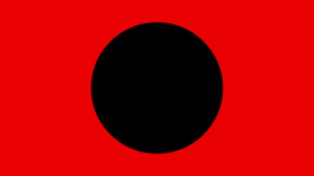 Abstract red circular shape expanding and filling the screen on black background.