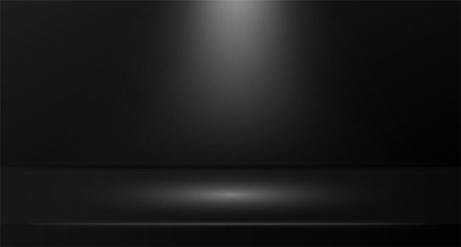 Dramatic spotlight shining on empty dark stage with circular illuminated floor area