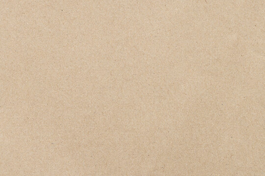 Brown kraft paper texture background for design and decoration,Macro,Full Frame Texture of Ribbed Brown Corrugated Cardboard Packaging Material