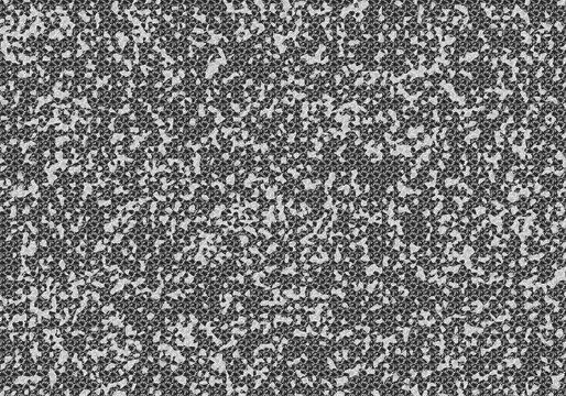 Abstract grunge texture featuring monochrome patterns with distressed spots and noise elements for creative artistic background