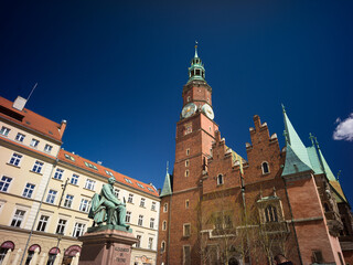 Obraz premium Wroclaw, Poland, 24th April 2026, wide view of Wroclaw Old Town Hall aka Ratusz with clock tower