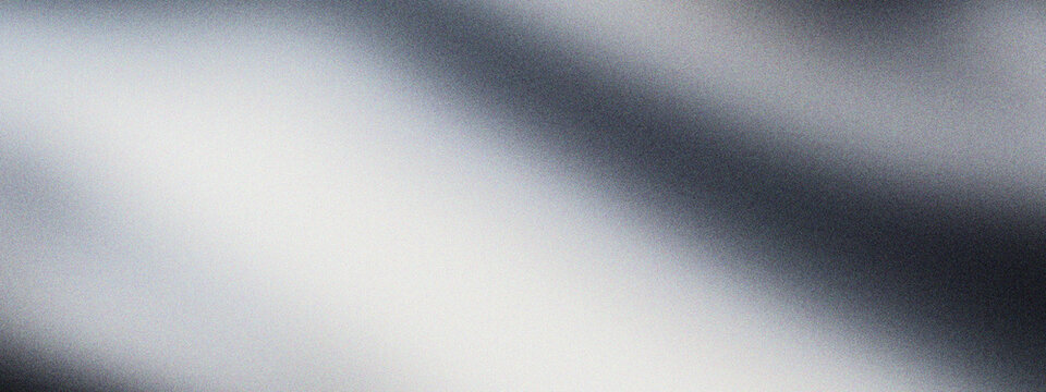 Abstract silver silk fabric background, elegant grey satin texture with soft flowing waves. Luxurious metallic textile surface for fashion design, smooth draped cloth with subtle highlights.