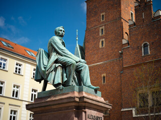 Fototapeta premium Wroclaw, Poland, 24th April 2026, statue sculpture of Aleksander Fredo outside the Wroclaw Old Town Hall aka Ratusz 