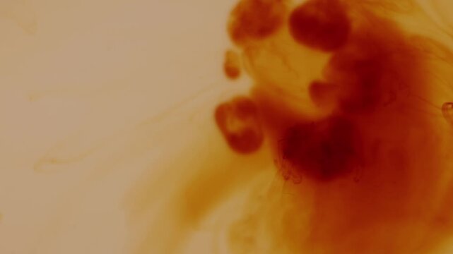 Fluid abstract composition with iodine mixing in water and forming dynamic patterns