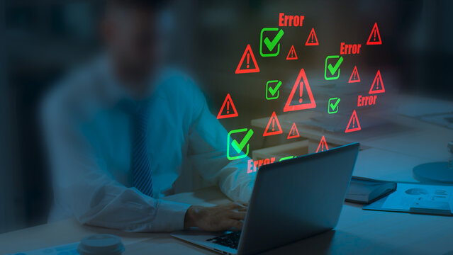 Businessman working on laptop with digital error warnings and check marks, cybersecurity risk concept, system failure alerts, data protection, software debugging, IT troubleshooting, technology issues