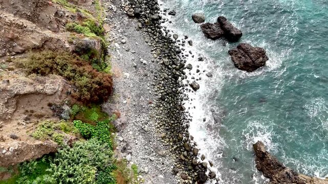 Aerial Drone Shot of Benijo Beach in North Tenerife. Above Scenery of Rocky Volcanic Beach with Rocks and Blue Atlantic Ocean in Canary Islands. 