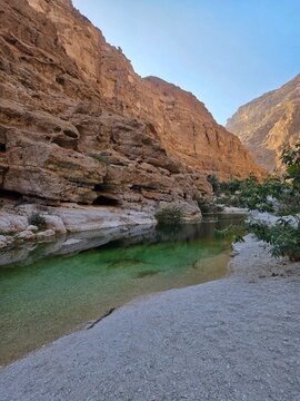 river in the mountains in wadi shab in Oman