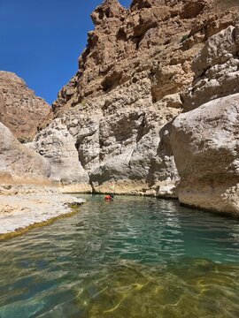 boat Swimming in the canyon in Wadi Shab in Oman