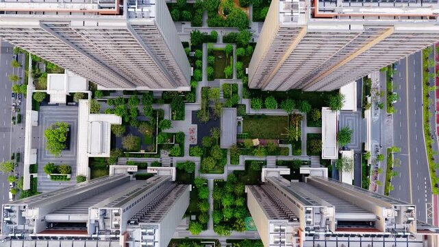 Aerial view of modern high-rise residential complex and urban housing development.