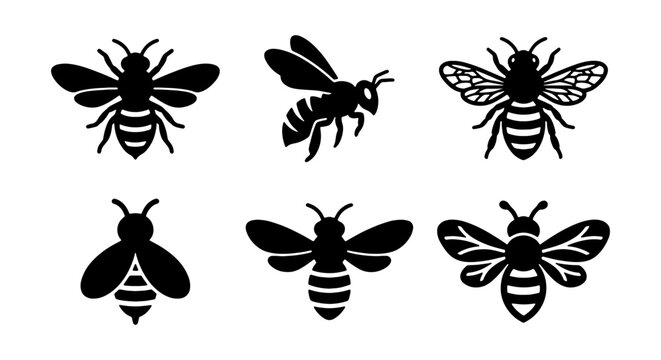 Collection of black bee silhouettes on with various poses and wing positions
