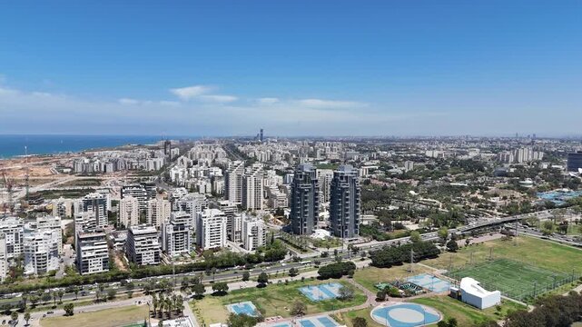 Aerial 4K view of Yarkon Park, green urban oasis and river in Tel Aviv, Israel
