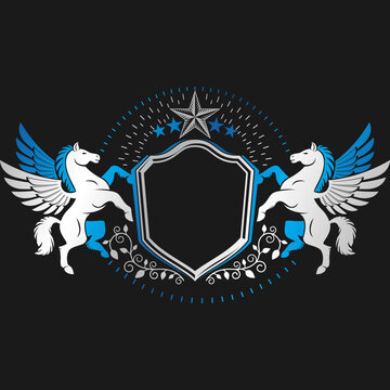 A striking graphic illustration on a black background features two mythical white pegasus horses with blue manes and wings, flanking a prominent silver shield emblem, adorned with stars and decorative