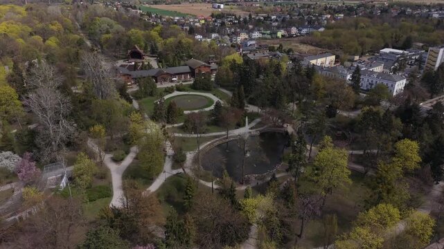 Wide aerial view of the Zdrojowy Park with its fountain and lush greenery in Ciechocinek, Poland