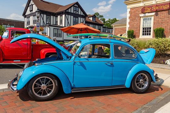 Andover, Massachusetts, US-July 14, 2024: Bright blue VW bug at local classic car show sponsored by the Andover Center for History and Culture.