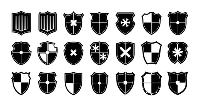 Heraldic shield icons set in black and white for logo or emblem design