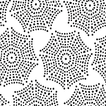 Hand-drawn dotted mandala seamless pattern for textile print for fabric, abstract boho tribal design in black and white