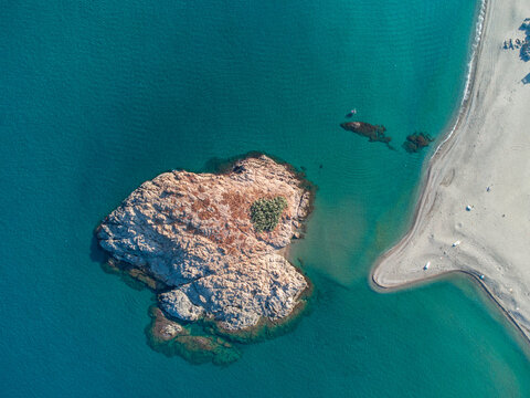 Aerial Nature Mediterranean sea Landscape with Turquoise Sea or Ocean Bay and Empty Sand Beach. Beautiful Vacation and Tourism Destination Drone top view summer day in Jijel Algeria.