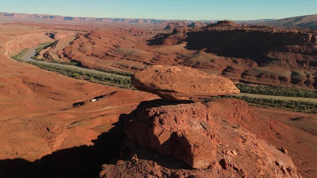 Aerial video of Mexican Hat, a unique balanced rock formation near Mexican Hat, Utah, USA.
