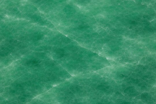 Imperial Jade Texture Seamless Pattern. Close-up imperial jade gemstone surface detail. Luxury green mineral pattern design. Realistic jade texture background. Detailed polished macro close-up. 