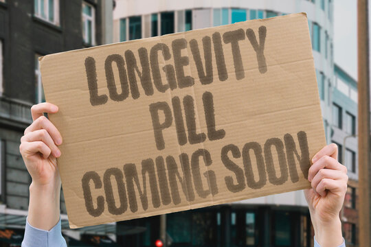 "Longevity Pill Coming Soon" Pharmaceutical research targets drugs that delay cellular aging. LONGEVITY. DRUG. CELLULAR. AGING. DELAY.