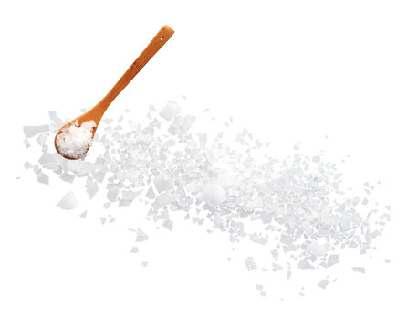 Sea salt flakes with wooden spoon top view isolated on transparent background
