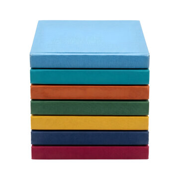 Stack of colorful books with textured covers, isolated on transparent background
