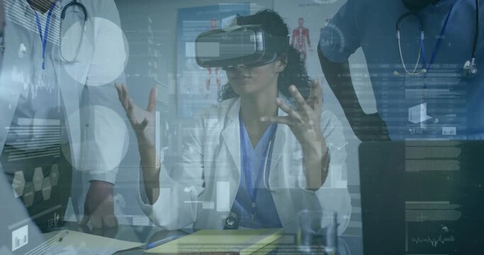 Doctor in VR headset gesturing, starting HUD panels and manipulating 3D anatomy for clinical review
