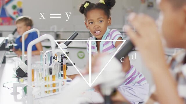 Girl leaning into microscope at science lab, causing animated geometry overlays showing relations