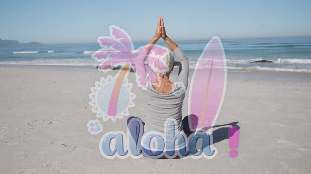Senior woman sitting on sand frames moving aloha centering arms rising calming for health creators