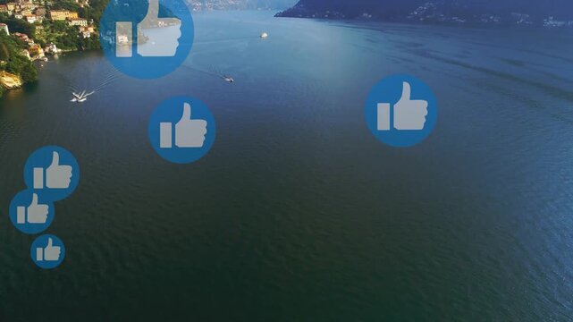 Playback starting, like icons appearing left, drifting center and growing, showing likes on lake